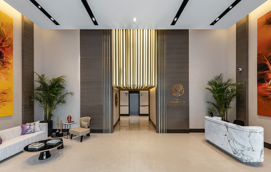 Cafe with cozy seating arrangements at Piramal Revanta