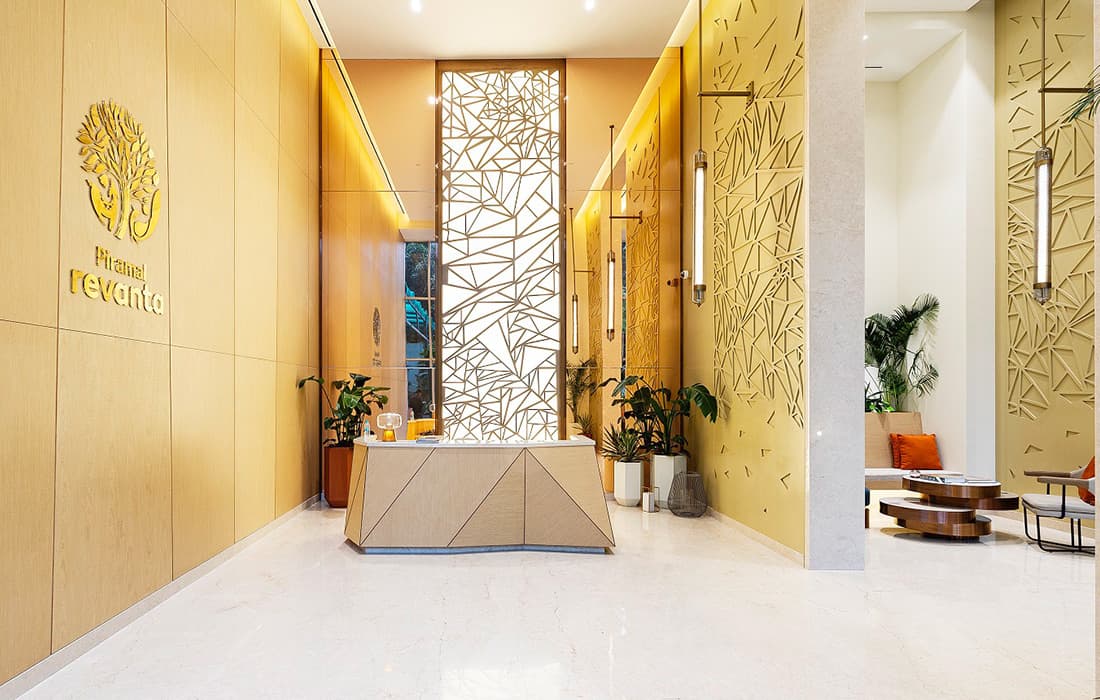 Cafe with cozy seating arrangements at Piramal Revanta